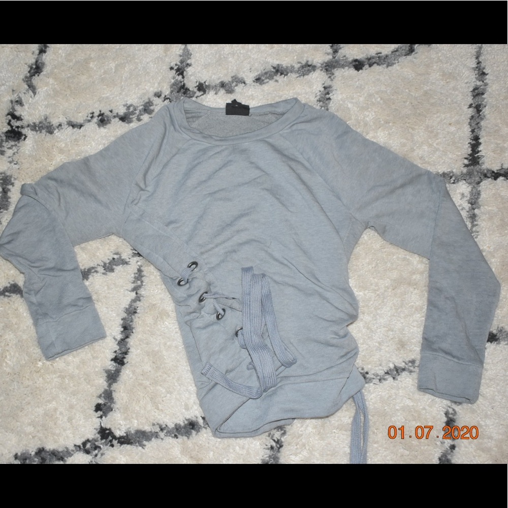Gray sweater with ties on the side